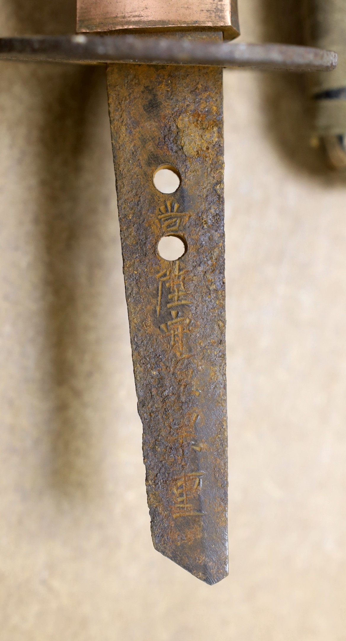 A Japanese wakizashi (corroded) with signed tang and a South African ebony knobkerrie, 80cm long